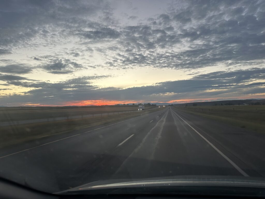 a photograph of a montana highway in the evening